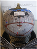 Pumpkin painted with scene of characters from The Nightmare Before Christmas playing baseball.