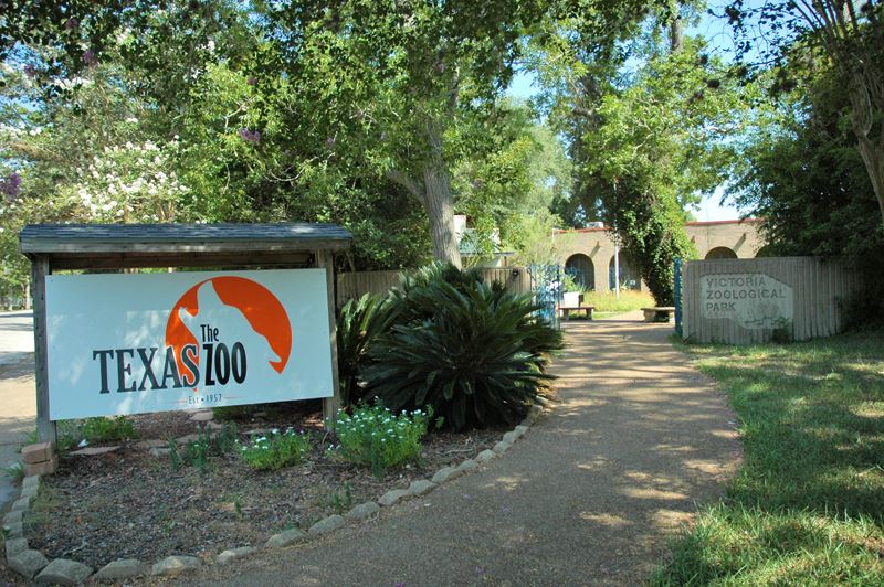 The Texas Zoo exterior with sign featuring a wolf silhouette