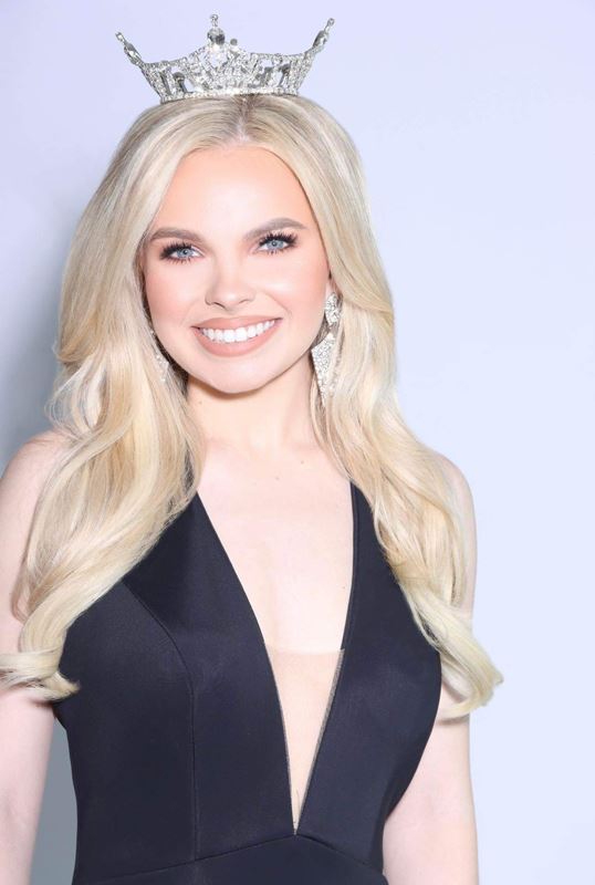 Madison Matlock, Miss DeWitt County 2023, wearing a dress and a tiara