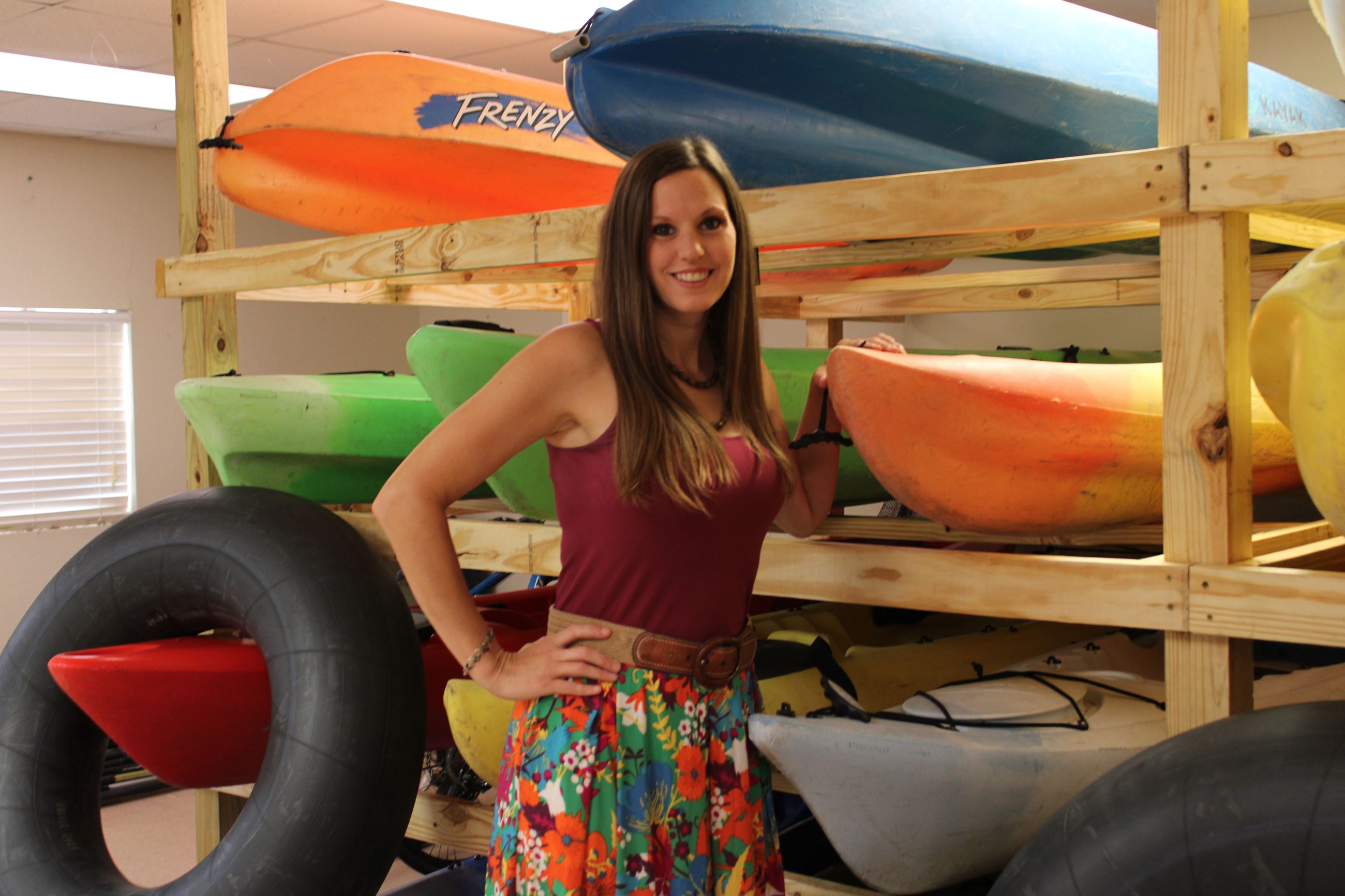 Ashley Magee poses with kayaks