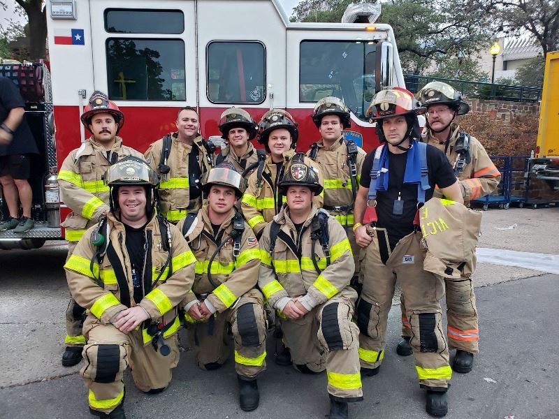 Members of the Victoria Fire Department pose for a photo
