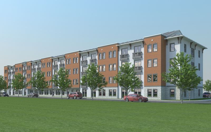 A multi-story apartment complex with small balconies