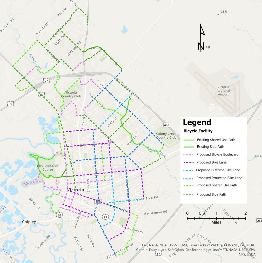 A map with a few solid lines showing current bike paths and many more dotted lines of proposed paths